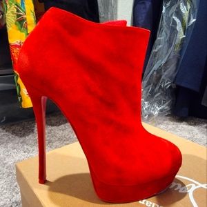 Red Louboutin suede booties